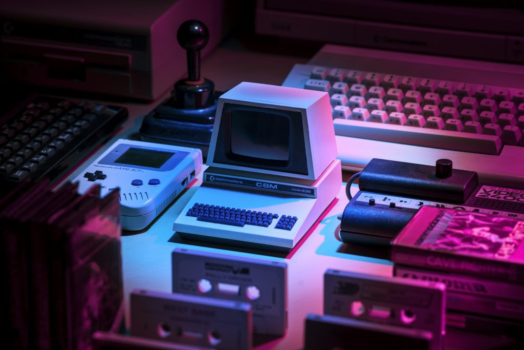 Retro computer and technology setup representing the evolution of AI image generation
